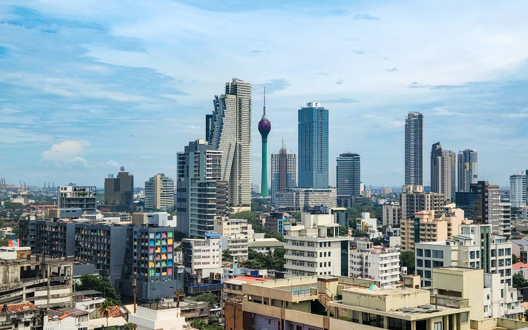 The Colombo skyline on a clear day, with the Lotus Tower among the high-rises